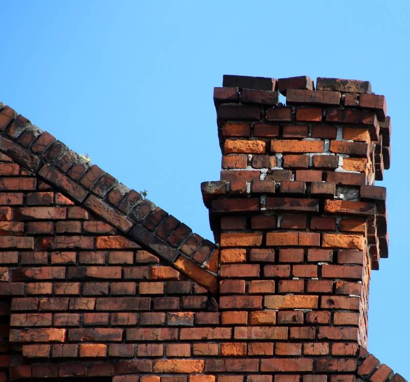 Blog Article - Damaged chimney on an Billerica home showing cracks and missing mortar